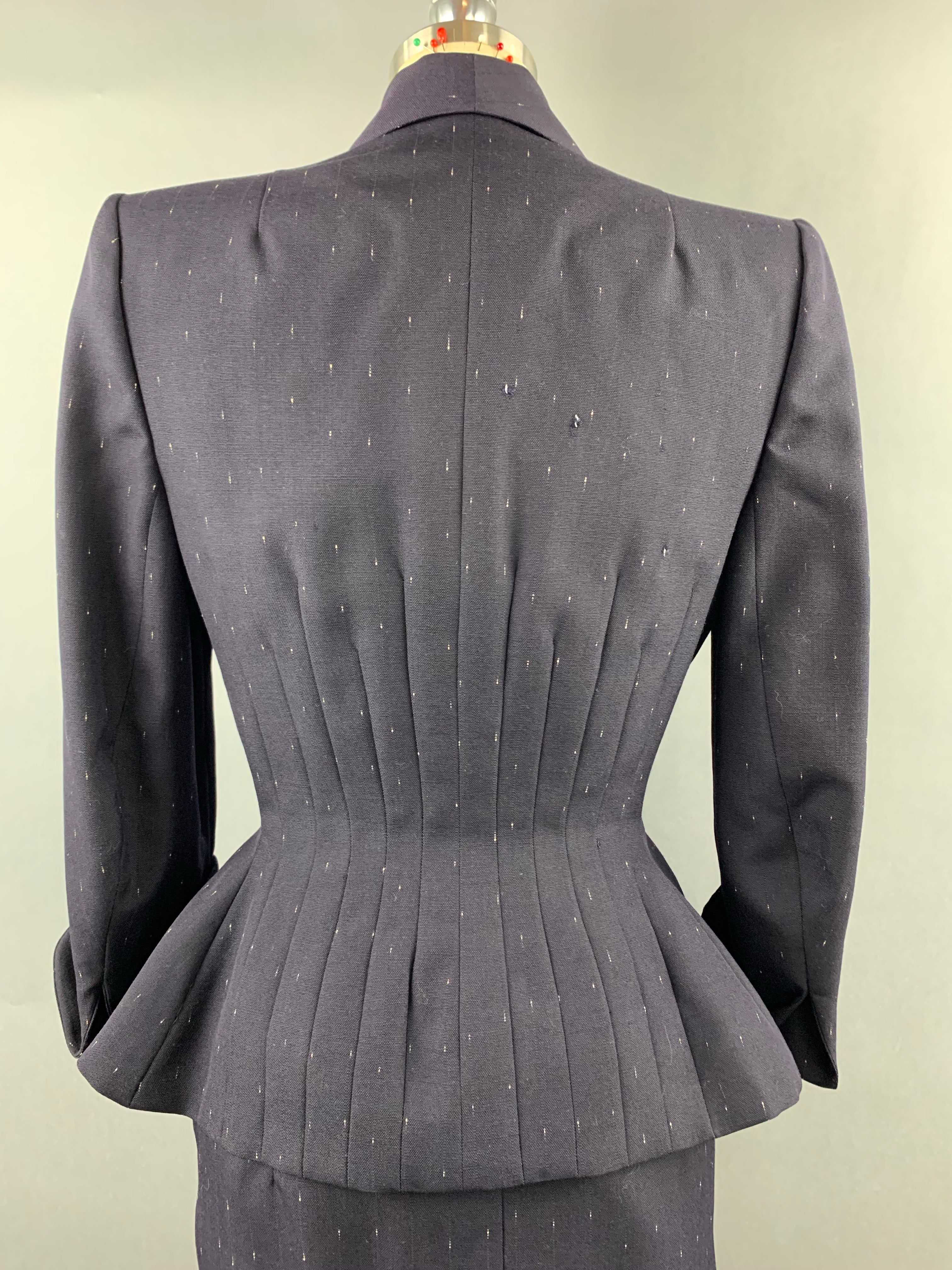 Late 1940s early 1950s Navy Blue with White Fleck Lilli Ann Peplum Suit Size M