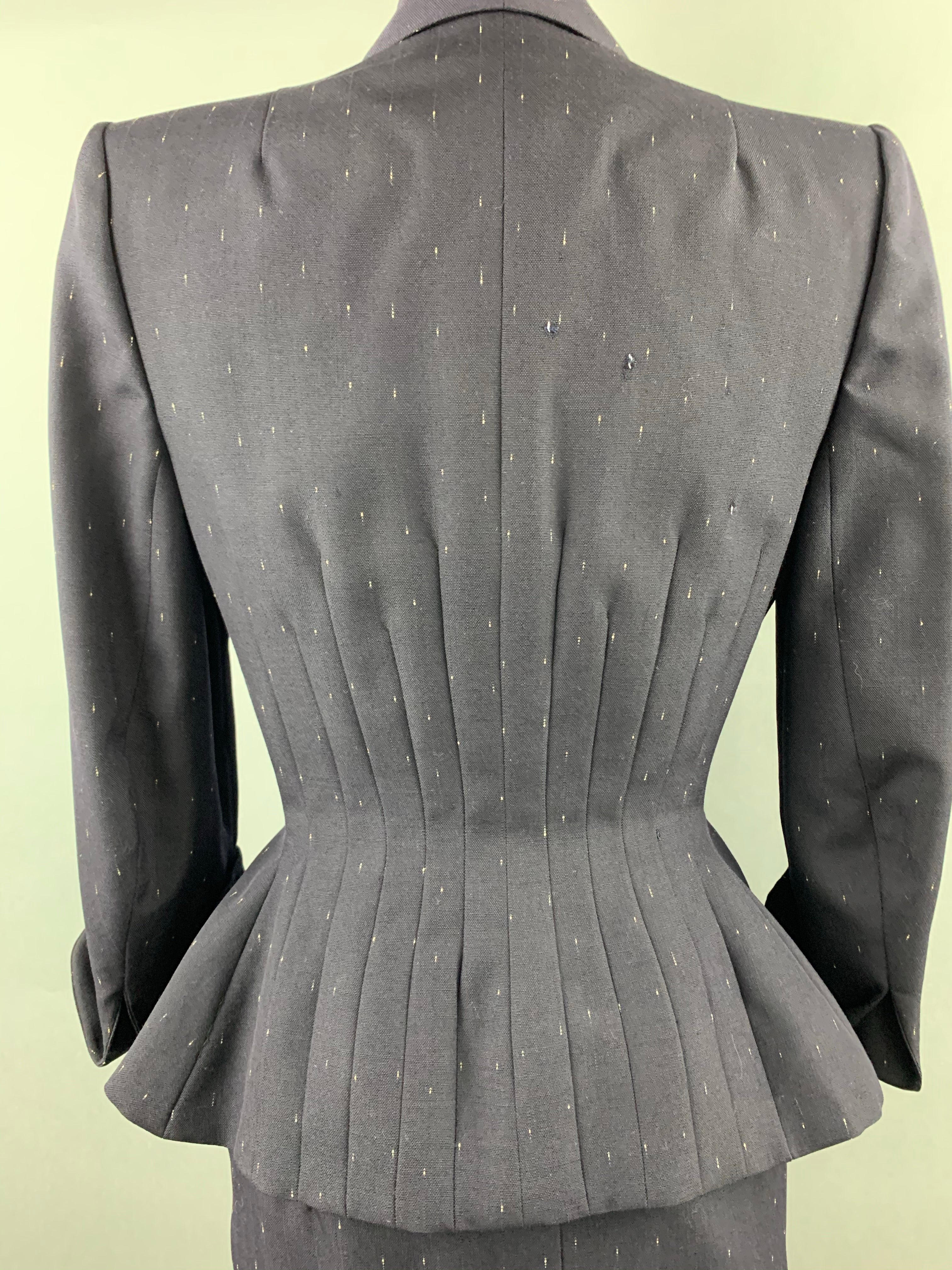 Late 1940s early 1950s Navy Blue with White Fleck Lilli Ann Peplum Suit Size M