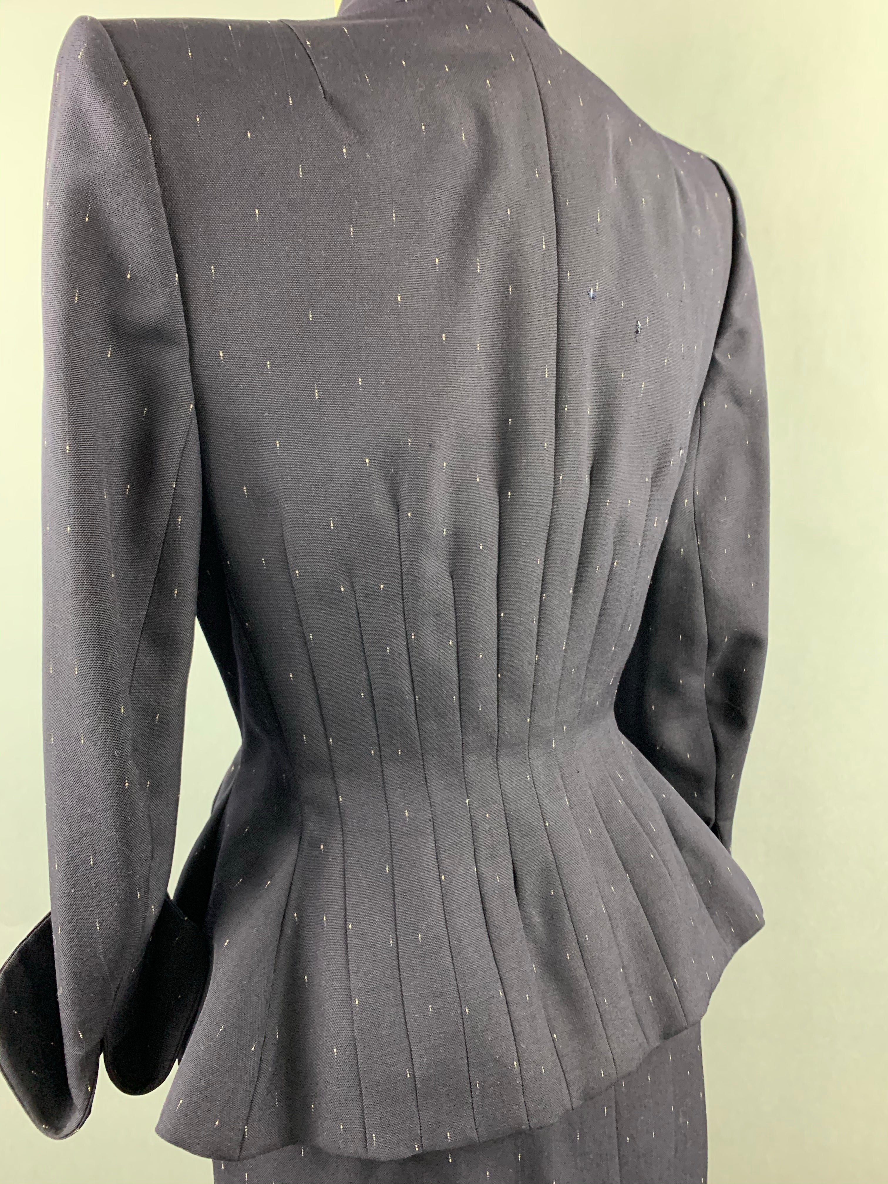 Late 1940s early 1950s Navy Blue with White Fleck Lilli Ann Peplum Suit Size M