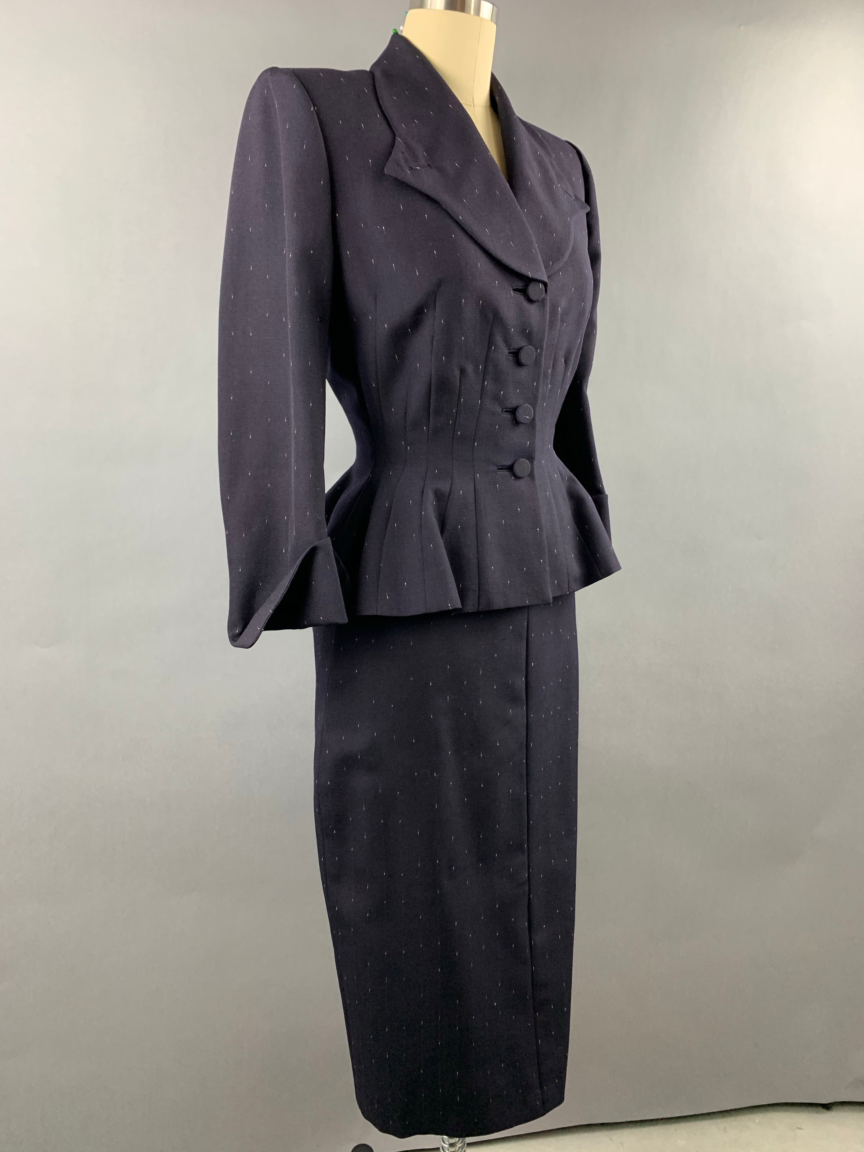 Late 1940s early 1950s Navy Blue with White Fleck Lilli Ann Peplum Suit Size M