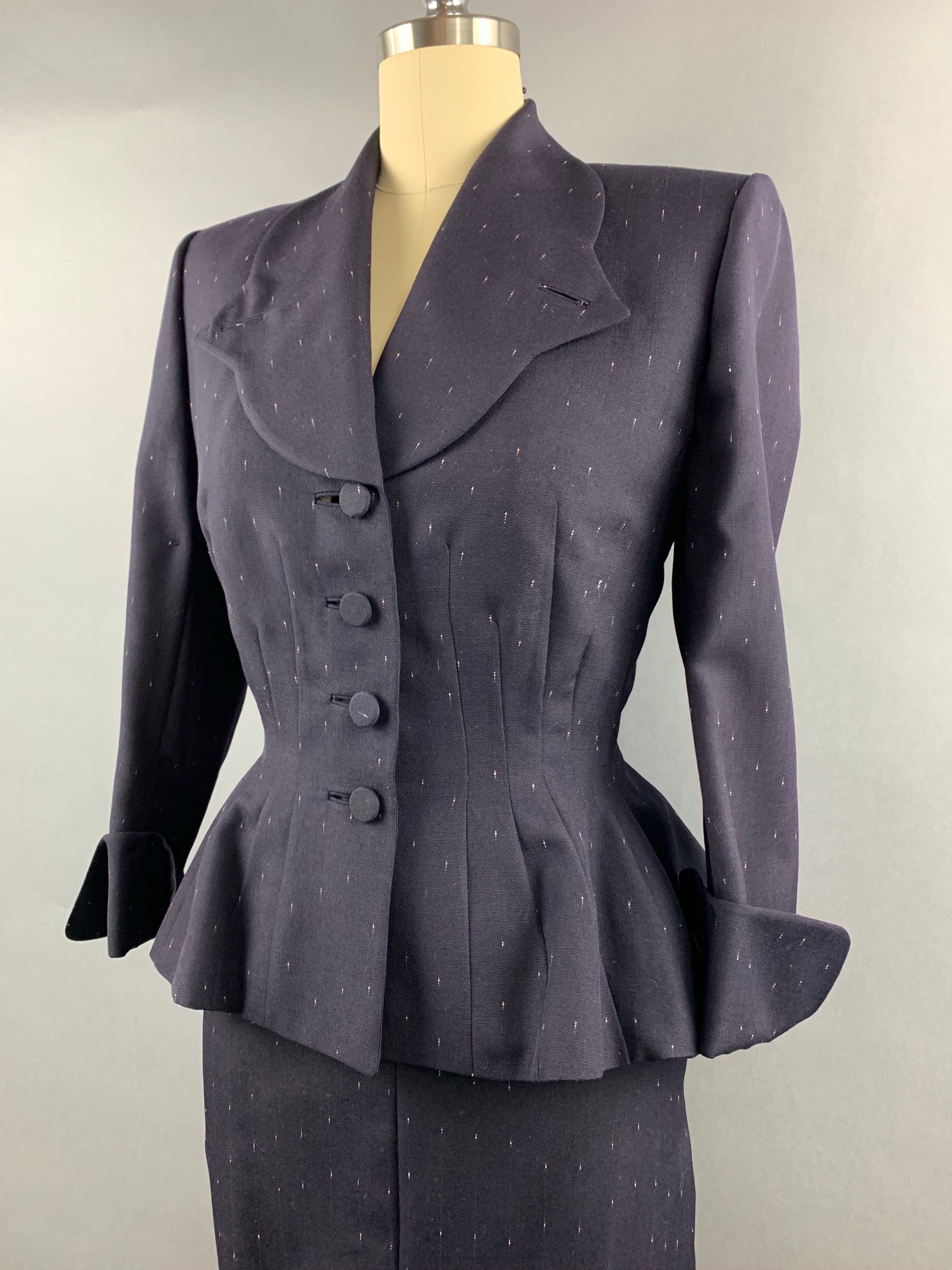 Late 1940s early 1950s Navy Blue with White Fleck Lilli Ann Peplum Suit Size M