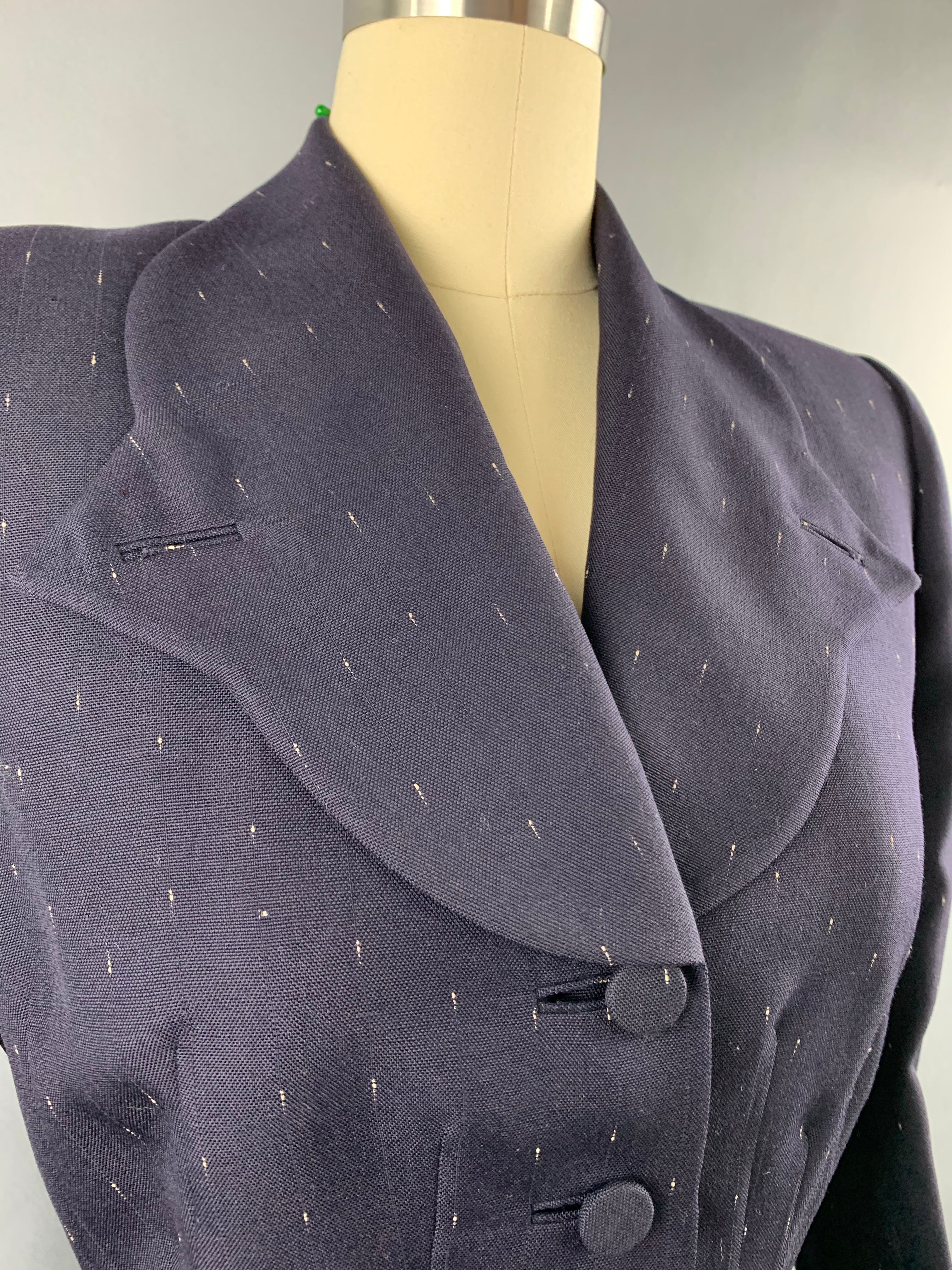 Late 1940s early 1950s Navy Blue with White Fleck Lilli Ann Peplum Suit Size M