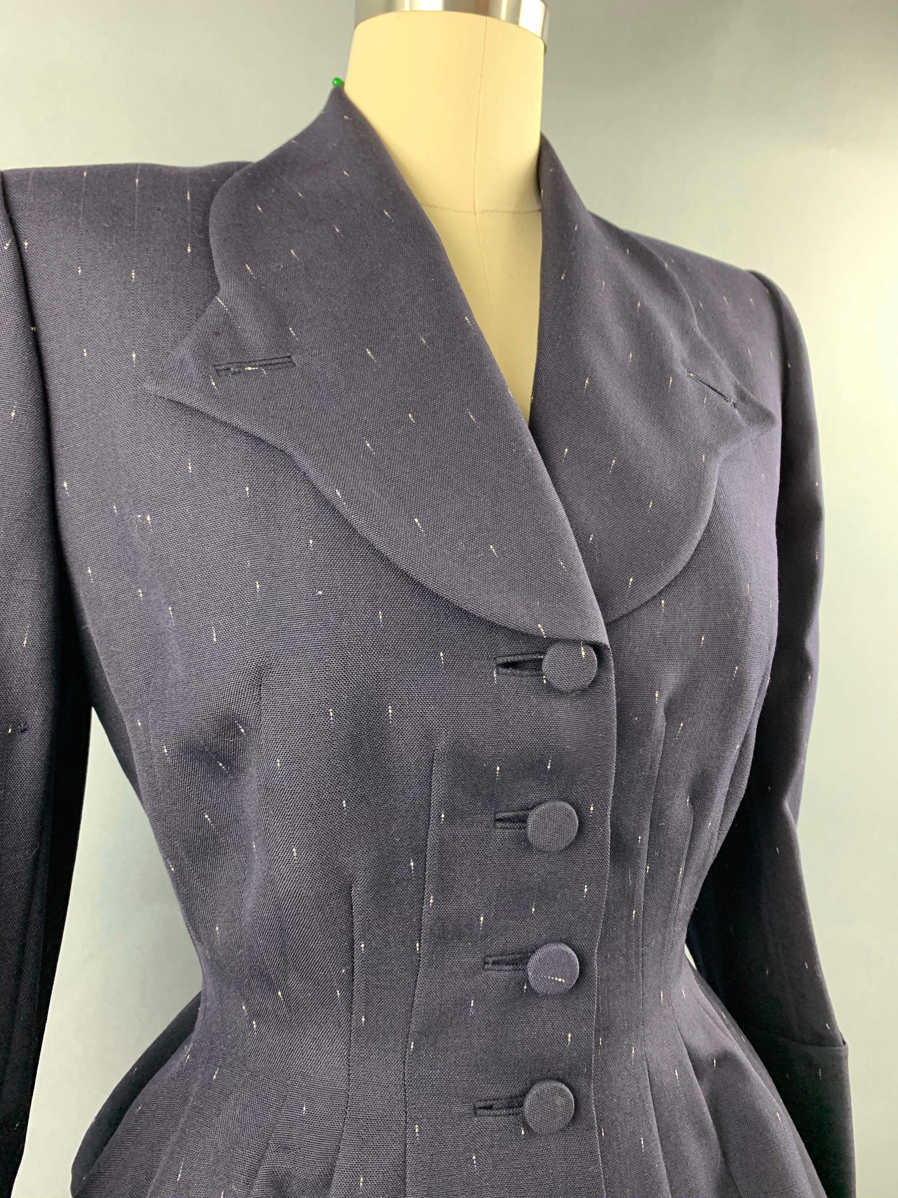 Late 1940s early 1950s Navy Blue with White Fleck Lilli Ann Peplum Suit Size M